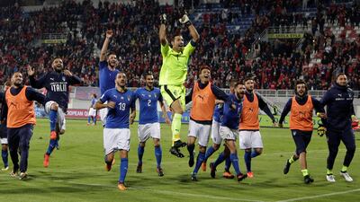 Gianluigi Buffon, centre, will travel to Sweden for the play-offs. Max Rossi / Reuters