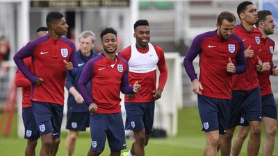 English players Marcus Rashford, left, Raheem Sterling, and Daniel Sturridge practice during their training session at the Stade des Bourgognes in Chantilly, France on 19 June 2016. England will face Slovakia in their last match of the Group B on 20 of June. EPA/GEORGI LICOVSKI