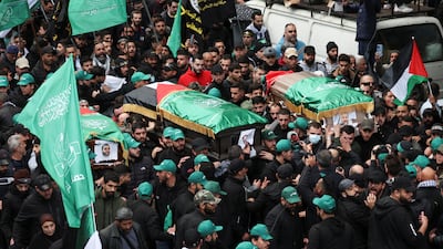 Mourners gather during the funeral. Reuters