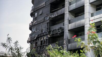 The blaze at Zen Tower on May 13, 2018, forced more than 100 residents to flee and caused substantial damage to the building in Dubai Marina. Reem Mohammed / The National