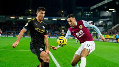 Manchester City's Rodri (L) in action with Burnley's Dwight McNeil. EPA