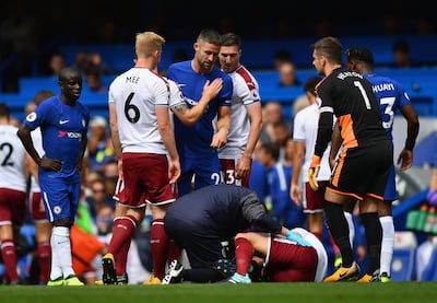 Chelsea's Gary Cahill checks that Steven Defour of Burnley. Dan Mullan / Getty Images