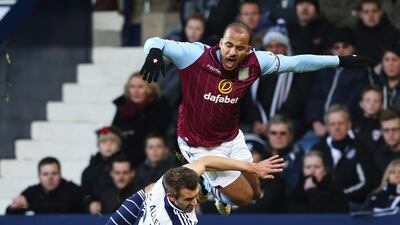 Gabriel Agbonlahor of Aston Villa is tackled by Gareth McAuley of West Brom during their match in the Premier League on Saturday. Jan Kruger / Getty Images