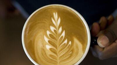 Customers everywhere are choosing coffee shops for a quick snack. Jeff Topping / The National