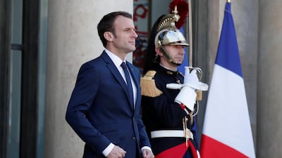 Emmanuel Macron waits for the arrival of Senegalese President Macky Sall at the Elysee Palace on April 20, 2018. France's youngest president visits Washington on April 23 with high international standing despite poor ratings at home. Benoit Tessier / Reuters