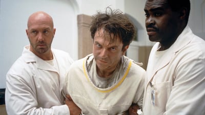 In the Mouth of Madness reveals the unsettling side of Sam Neill's acting prowess. Photo: New Line Cinema