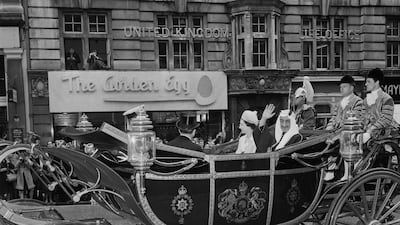 Queen Elizabeth II with King Faisal of Saudi Arabia travelling along Whitehall for a military pageant by the King's Troop Royal Horse Artillery, London, 10th May 1967. Photo: Daily Express/Hulton Archive/Getty Images