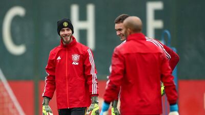 Goalkeeper David de Gea (left) during the training session. PA