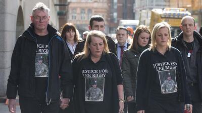 Relatives of murdered fusilier Lee Rigby — left to right — his stepfather Ian Rigby, his sister Sara McClure and his mother Lyn Rigby, arrive at the Old Bailey to attend the sentencing of Michael Adebolajo and Michael Adebowale. Oli Scarff / Getty Images