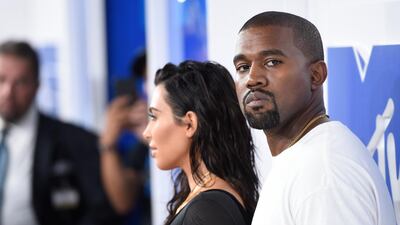 Kim Kardashian West, left, and Kanye West AP