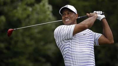 Tiger Woods has played just twice this year and has looked woefully out of form. Jeff Roberson / AP Photo