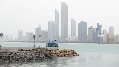 Cloudy weather in Abu Dhabi and across the country with rain forecast in the northern areas. Khushnum Bhandari for The National
