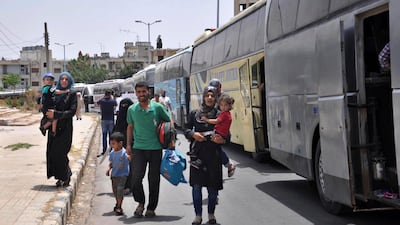Syrians arriving from Jarablus, in Aleppo province, to their old neighbourhood of Al Waer, in Homs, Syria on July 11, 2017. They left their homes to escape the government of Syrian president Bashar Al Assad, but are now going back, worn out by hardship and depravations of months of living in tents. SANA via AP