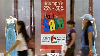 People shopping in Al Ghurair Mall during the Dubai Shopping Festival. Charles Crowell for The National
