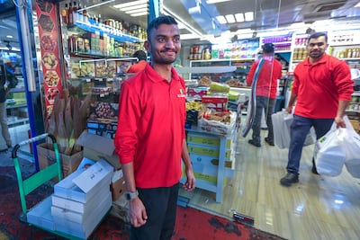 Ali Ashoor Dates Shop salesman Mohamed Asif Ayman. Victor Besa / The National