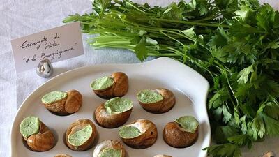 Escargots in shells a la bourguignonne. Courtesy Maison Duffour