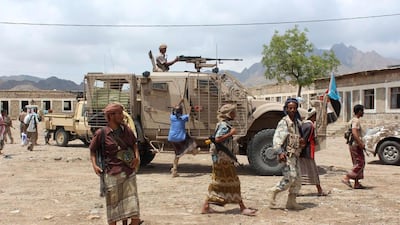 Pro-government forces fight Houthi rebels in the Karesh area of Yemen's southern Lahj province on May 13, 2016. AFP