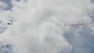 A plane with a banner flies over the Cricket World Cup match between India and Sri Lanka at Leeds. Lee Smith / Reuters