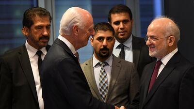 UN Special Envoy of the Secretary-General for Syria Staffan de Mistura shakes hands with Iraqi Foreign Minister Ibrahim Al Jaafari (R)ahead of the United Nations General Assembly. Reuters