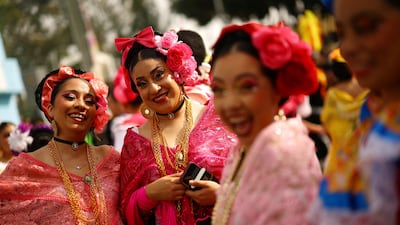 Mexico fans wear traditional clothing. Reuters