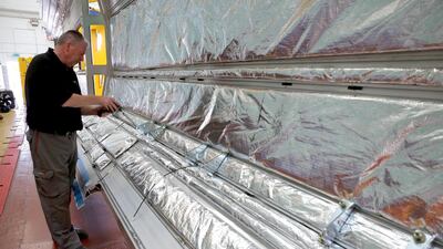 Technicians work on London Underground trains at the Bombardier Transport manufacturing plant in Derby, England. Christopher Furlong / Getty Images
