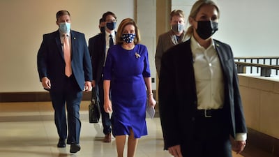 US Speaker of the House, Nancy Pelosi walks to her weekly press briefing on Capitol Hill in Washington, DC. AFP
