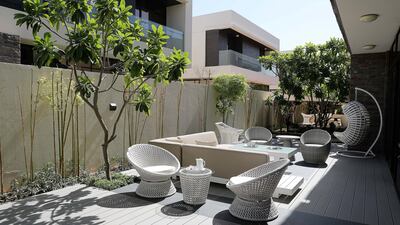 View of the outside sitting area inside a 5-bedroom villa in Damac Hills, Dubai. Photo by Pawan Singh / The National