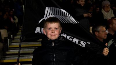 A young New Zealand fan watches the rugby Test match between New Zealand and South Africa at AMI Stadium in Christchurch on September 17, 2016. Marty Melville / AFP