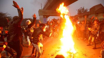 Demonstrators burn an effigy depicting Prime Minister Narendra Modi in New Delhi. Reuters