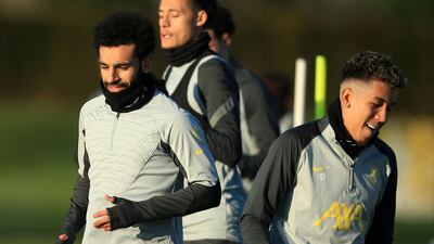 Liverpool's Mohamed Salah and Roberto Firmino. AFP