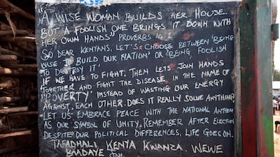 Graffiti promoting peace outside Ondugu Polling Station in the constituency of Kibera in Nairobi.