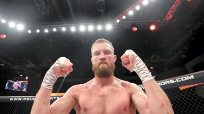 Dan Moret celebrates beating Anton Kuivanen in the lightweight division. Chris Whiteoak / The National