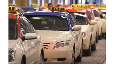 Readers say the law banning taxi sharing has safety and environmental implications. Pawan Singh / The National