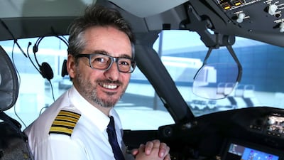 Etihad captain Mimmo Catalano, 40, has clocked up 11,000 hours in the cockpit. Victor Besa / The National
