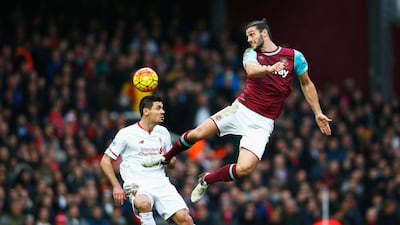 West Ham striker Andy Carroll leaps for a header during his team’s win against Liverpool. Christopher Lee / Getty Images