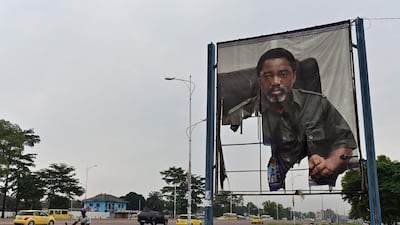 A tattered poster of former DRC president Joseph Kabila in Kinshasa. Tony Karumba / AFP
