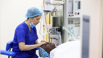 Akaaninuie Inyang, from Nigeria, is being treated at RAK Hospital and said he wished his home country had facilities similar to that of the UAE. Pawan Singh / The National