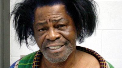 James Brown after his arrest in January 2004 for criminal domestic violence. Getty Images