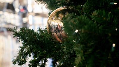 Sustainability experts say the carbon footprint created by importing a real Christmas tree into the UAE needs to be considered when choosing a tree. Photo: AFP