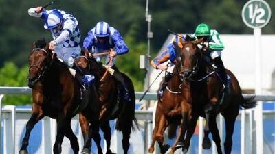 Al Kazeem, left, rode by jockey James Doyle, won the Eclipse Stakes on Saturday. Alan Crowhurst / Getty Images
