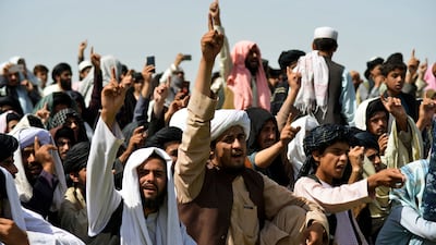 Taliban supporters gather in Kandahar to celebrate the withdrawal of all US troops from Afghanistan. AFP