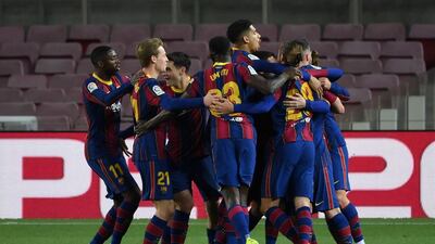 Barcelona's players celebrate after Lionel Messi's goal. AFP