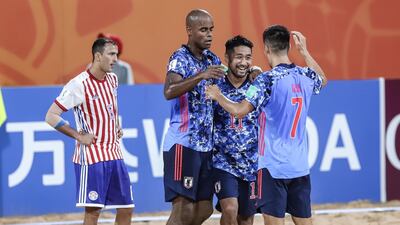 Japan celebrate a goal against Japan. EPA
