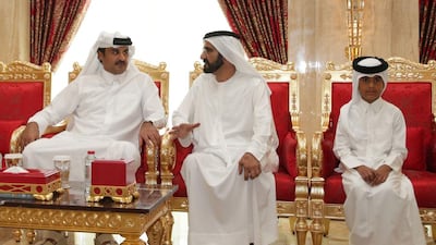 Sheikh Mohammed bin Rashid accepts condolences from Qatar emir, Sheikh Tamim bin Hamad Al Thani, for his son. Courtesy Wam