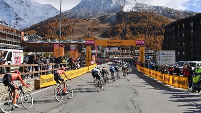 The peloton dides through the village of Sestriere during Stage 20 of the Giro d'Italia on Saturday, October 24. AP