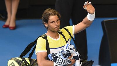 Rafael Nadal gestures as he leaves the court after defeat in his Australian Open first-round match on Tuesday. William West / AFP / January 19, 2016