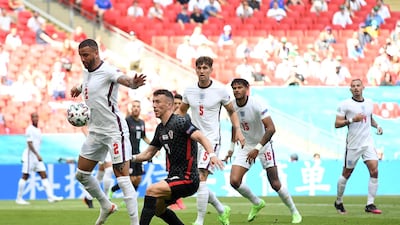 Kyle Walker of England shields the ball from Ivan Perisic of Croatia. Getty