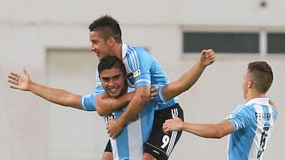Rodrigo Moreira, left, and his Argentine teammates celebrate moving into the semi-finals at the Fifa Under 17 World Cup with a victory over Ivory Coast. EPA