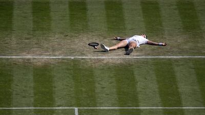 Tunisia's Ons Jabeur celebrates winning her third round match against Spain's Garbine Muguruza.