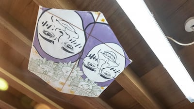 There is an added vibrancy to the neighborhood this year, thanks to outdoor art installations, carefully designed shading and signs.